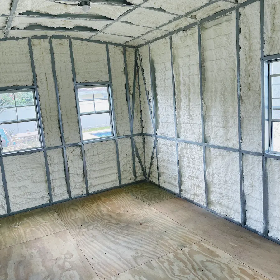 Closed-cell spray foam insulation applied to wall cavities in a residential project in Williamson